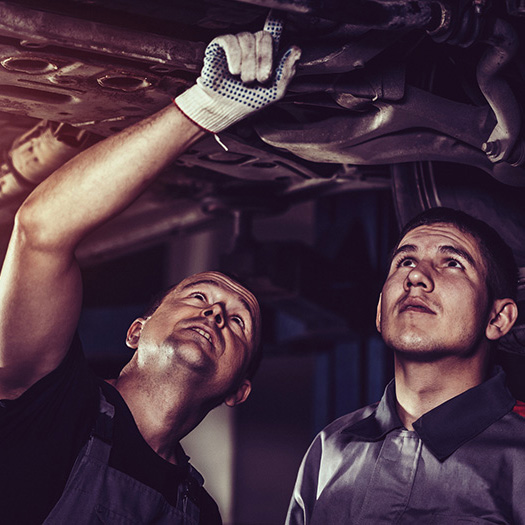 Repairing a car in auto repair shop
